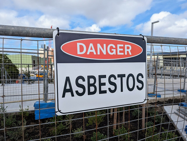 An asbestos warning sign in Denver